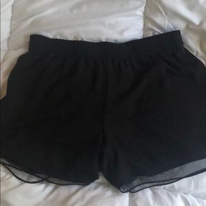 Aritzia Babaton Size L black “silky” shorts